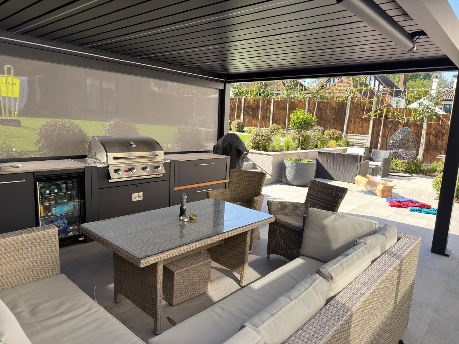 SOLA pergola interior with BBQ kitchen and lounge